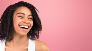 Emotions Concept. Happy afro girl laughing and looking at empty space on white background, panorama photo