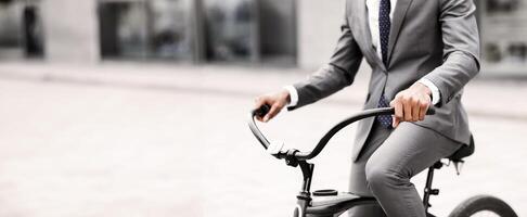An executive is biking to work in an urban setting. The mood is energetic and productive, capturing the essence of a modern professional lifestyle, cropped photo