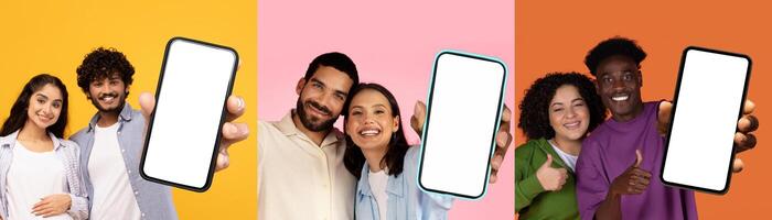Diverse young couples showing smartphones with white blank screens, posing on colorful background, recommending nice mobile app photo