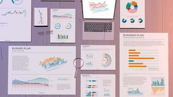 Animation of workspace with business data infographics. video