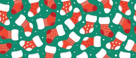 Seamless festive pattern with Christmas socks on a green background. vector