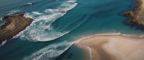 An aerial view of the ocean and beach photo