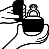 A hand holding a ring in a box vector