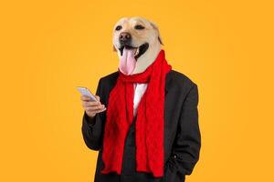 A dog wearing a suit and a vibrant red scarf stands proudly while holding a smartphone. The dog's expression is joyful, and the bright yellow background adds a playful touch to the overall mood. photo
