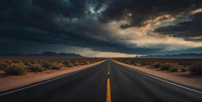 An empty road in the desert with storm clouds photo