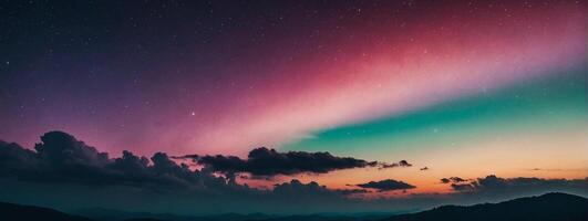The aurora borealis over the mountains photo