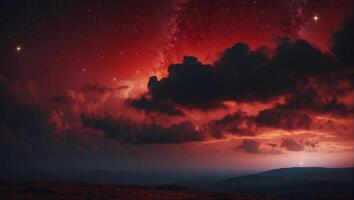 A red sky with clouds and stars over a mountain photo