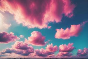 Pink clouds in the sky over a field photo