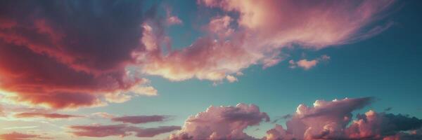 A beautiful sunset with clouds in the sky photo