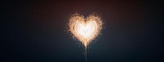 A sparkler is shown in the shape of a heart photo