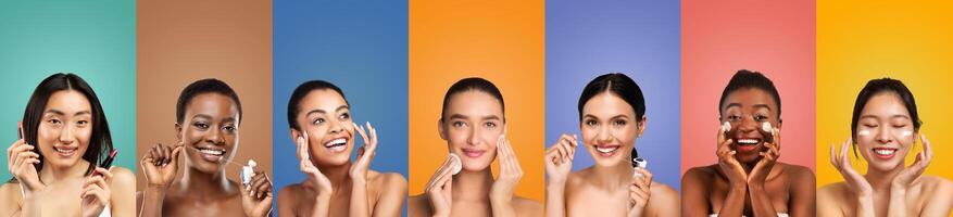 Seven multiethnic women apply skincare products to their faces while smiling. They are posed in front of a colorful background with each woman against a different solid color. photo