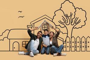Happy African American family sitting on the ground are gathered in front of a detailed drawing of a house. They appear engaged in conversation or observation of the artwork. photo