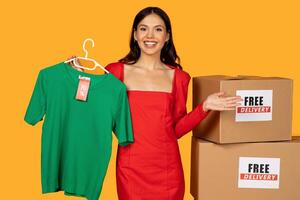A woman is standing next to a box filled with clothes, while a sign advertising free shipping is displayed prominently. The woman appears to be examining the contents of the box photo