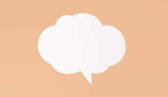 White paper speech bubble sits on peach background. The bubble is shaped like cloud and has single tail pointing downwards. It is a simple, clean image that could be used for a variety of purposes photo