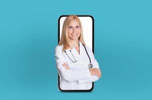 A woman wearing a white doctor coat is standing on the screen of a phone, appearing larger than life. Her presence on the device is surreal and unexpected, creating a striking visual contrast. photo