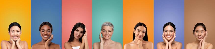 Seven diverse women with different skin tones and hair colors smile at the camera with their hands on their cheeks. They are positioned against a colorful background photo