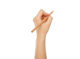 Female hand holding pencil isolated on white background, close-up, cutout, copy space photo