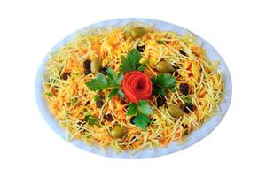 Salpicao is a typical Brazilian salad, made with shredded chicken and potato sticks isolated on white background photo