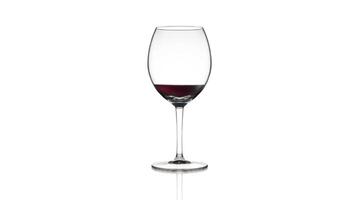 Empty goblet filling up with red wine on white background video