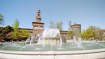 Tourists visit Fountain of Castle square on sunny day video