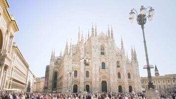 Crowded square in center of Milan against Duomo church video