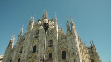 Street lantern installed on square against Duomo in Milan video
