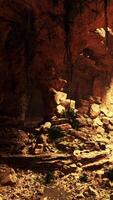 A mysterious cave nestled in the side of a majestic mountain video