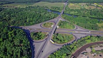Aerial view of a highway intersection with a clover-leaf video
