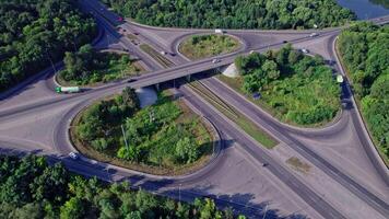Aerial view of a highway intersection with a clover-leaf video