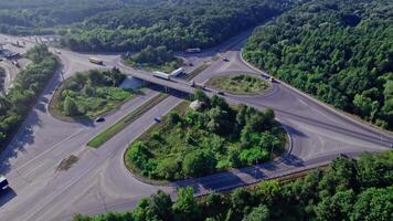 Aerial view of a highway intersection with a clover-leaf video