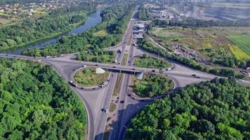 Aerial view of a highway intersection with a clover-leaf video