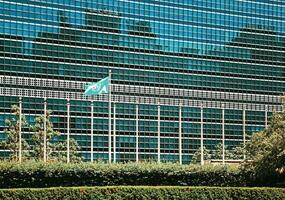 A large building with a large flag on top of it photo
