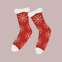 Christmas pair of red socks with snowflake pattern. Flat illustration vector