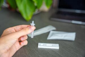 Rapid Antigen Test kit with all needed during swab COVID-19 testing. Coronavirus Self nasal or Home test, Autumn exacerbation of viruses. High quality photo