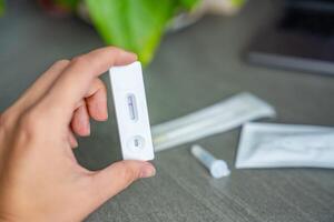 Rapid Antigen Test kit with with negative result during swab COVID-19 testing. Coronavirus Self nasal or Home test, Autumn exacerbation of viruses. High quality photo