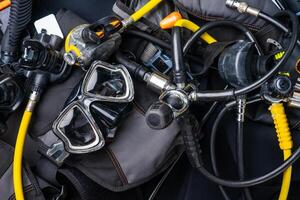 Scuba Fins, Regulator Octopus, Depth Gauge , Balanced Regulator ,Power Inflator ,Dive Mask and Snorkel , Scuba Gear for a Dive on a Boat photo