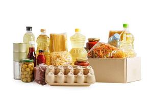 Foodstuffs for donation isolated on white background with clipping path for volunteer to help people. photo