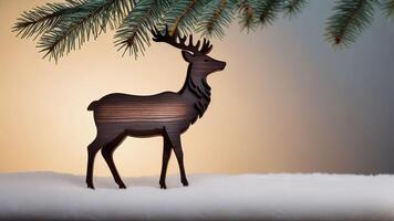 figurine of a wooden deer on a minimalistic New Year's background in Scandinavian style photo
