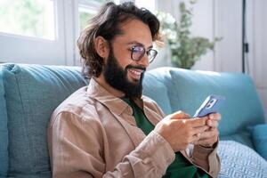 using cell phone hand holding texting message on screen mobile chatting friend photo