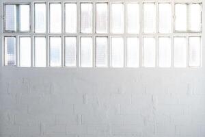 Empty industrial window space with white walls background with copy space for text. photo