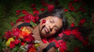 A Serene and Beautiful Scene Surrounded by Soft and Colorful Rose Petals Everywhere video