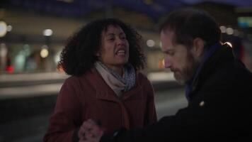 Dramatic and Intense Encounter Between Two Figures in a Vibrant Urban Setting and Scene video