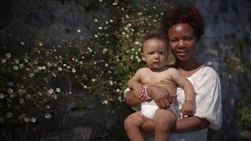 A loving Mother and her Child Joyfully Embracing Nature in a Serene and Peaceful Setting video