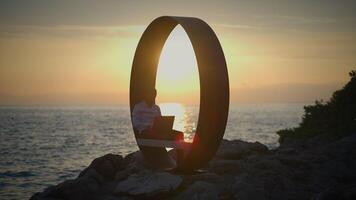 Experience a Serene Work Environment featuring a Beautiful Sunset and Stunning Ocean View video