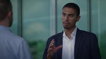 Engaging in Business Meeting Discussions within a Modern and Dynamic Office Setting video