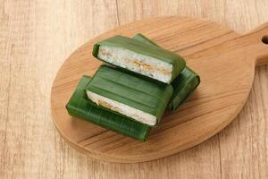 Lemper Ayam, Indonesian snack made of glutinous rice filled with seasoned shredded chicken or beef floss photo