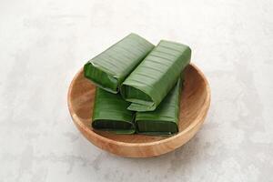 Lemper Ayam, Indonesian snack made of glutinous rice filled with seasoned shredded chicken or beef floss photo