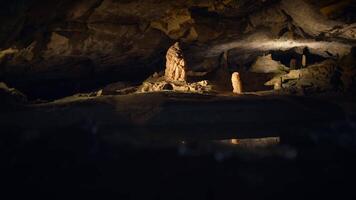 Illuminated Dark Rocky Stone Dripstone Caves Stalactite Background video