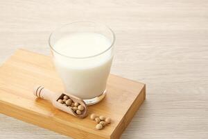 Susu Kedelai, glass of soy milk on dark background photo