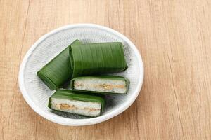Lemper Ayam, Indonesian snack made of glutinous rice filled with seasoned shredded chicken or beef floss photo